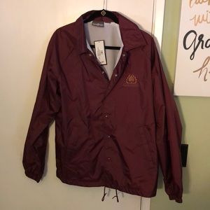 Brand new burgundy windbreaker